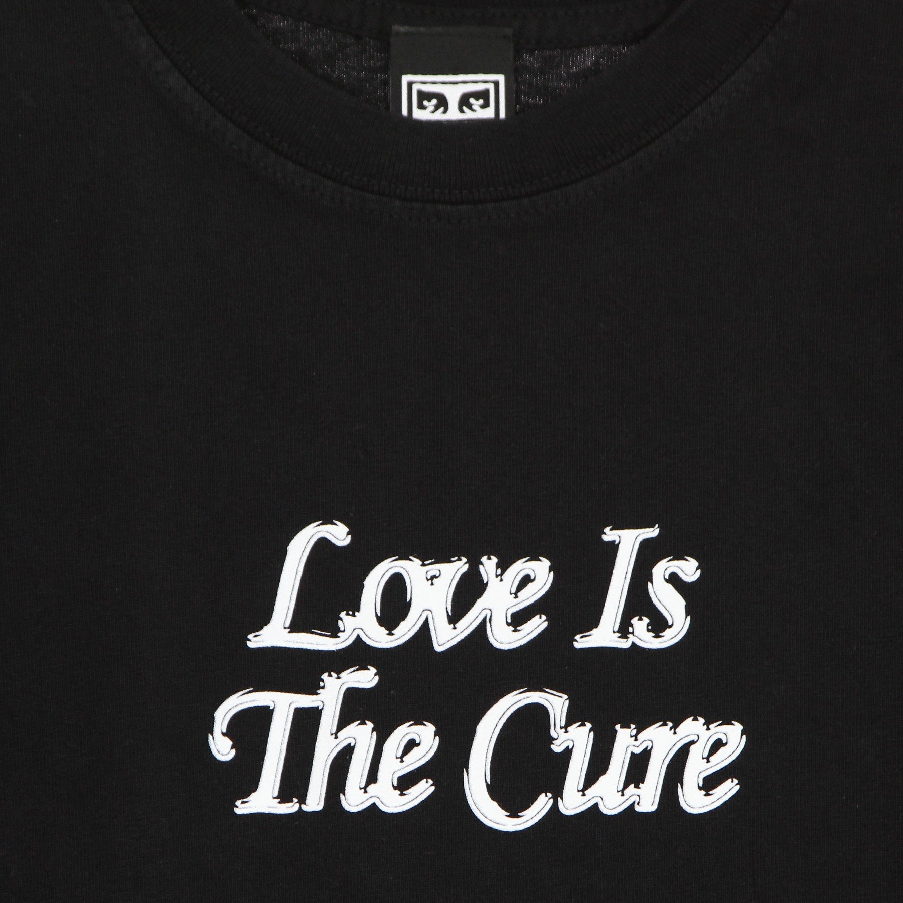 L'amour est le cure 2 Tee poids lourd sur le noir